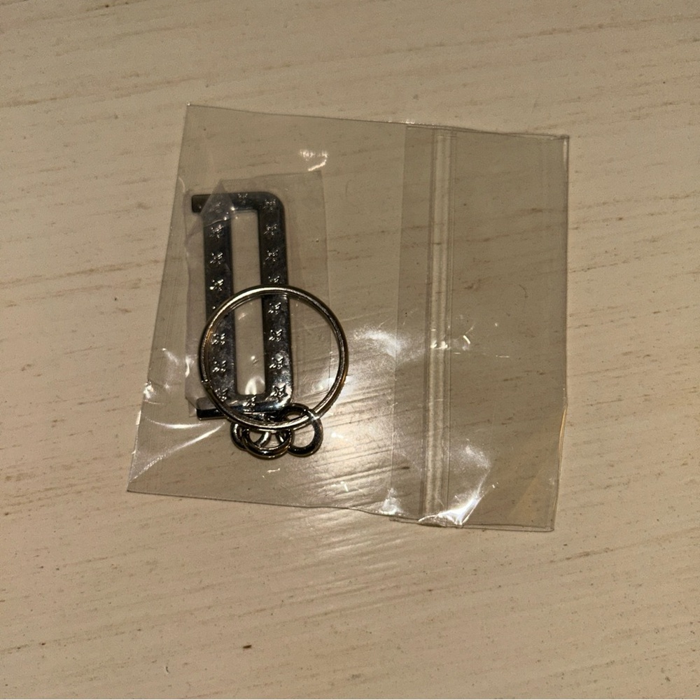 Dior authentic charm great for keychains